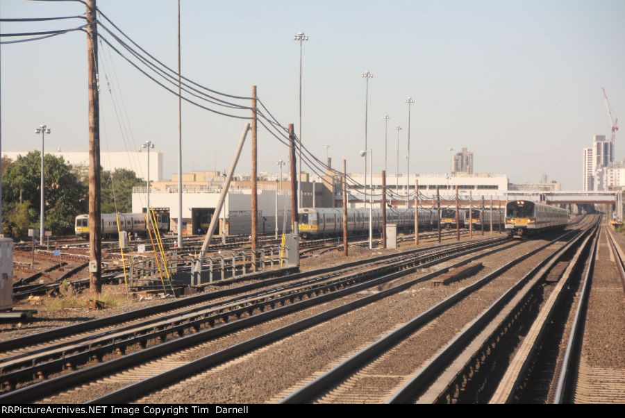 Looking west at back end of shops.